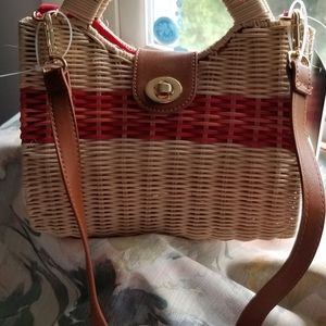 Wicker cut out handle crossbody bag.